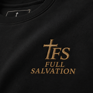 Macro detail of the 2x2 rib collar, self-fabric neck tape, and embroidered Full Salvation cross emblem on the Essential Organic Cotton Crewneck Sweatshirt in Black