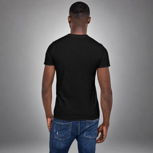 Man wearing a black Saved Delivered Healed embroidered t-shirt, back view