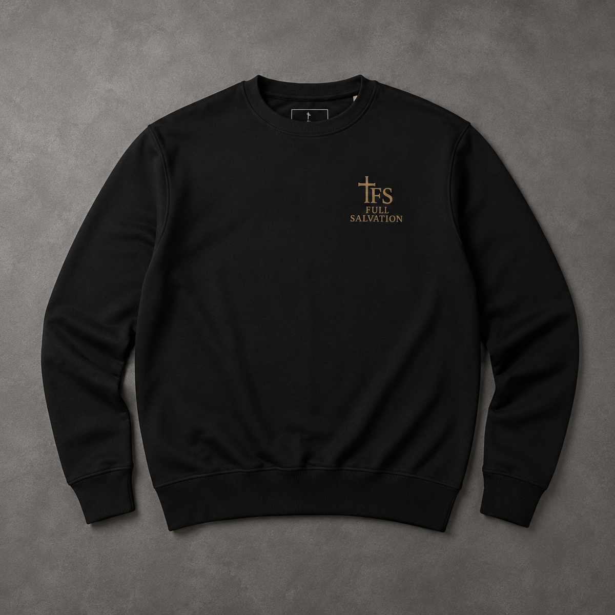 Man wearing the Full Salvation Apparel Essential Organic Cotton Crewneck Sweatshirt in Black, standing in studio, front view